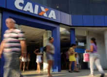 Lucro recorde da Caixa é resultado do corte de empregos e aumento de tarifas