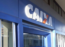 Caixa aumenta taxas, diminui repasse de benefícios sociais e tem lucro de 202%